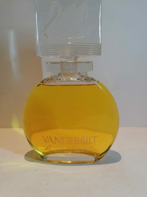 Flacon geant Vanderbilt parfum vintage, corps ambre et bouchon cygne cristal givre